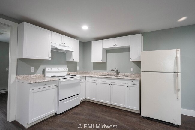 Building Photo - Charming 1-Bedroom Duplex with Modern Amen...