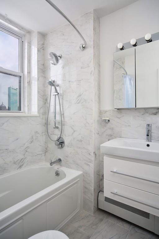 Admire the city from the shower - 483 Beacon St