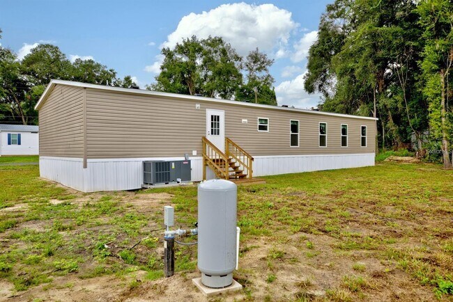 Building Photo - 8595 NW 13th Ct