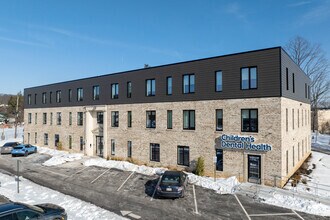 Building Photo - The Flats on 100