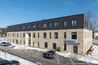 Building Photo - The Flats on 100