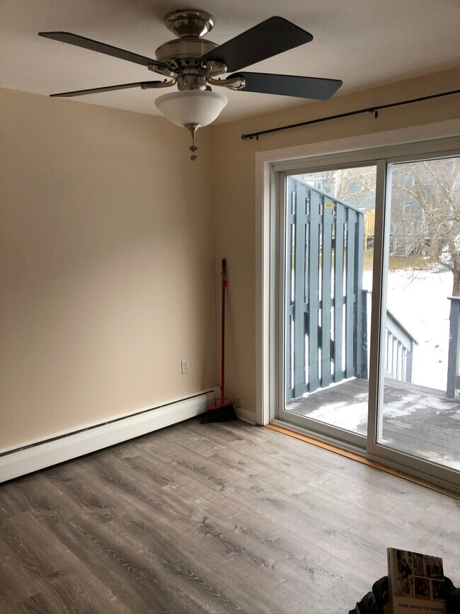 Other half of kitchen and back deck. - 207 Valley West Way