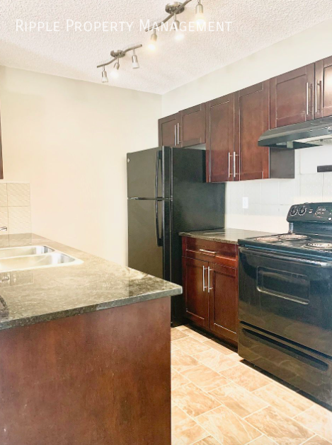 Photo du bâtiment - 50% OFF YOUR FIRST MONTHS RENT! AMAZING 2 ...