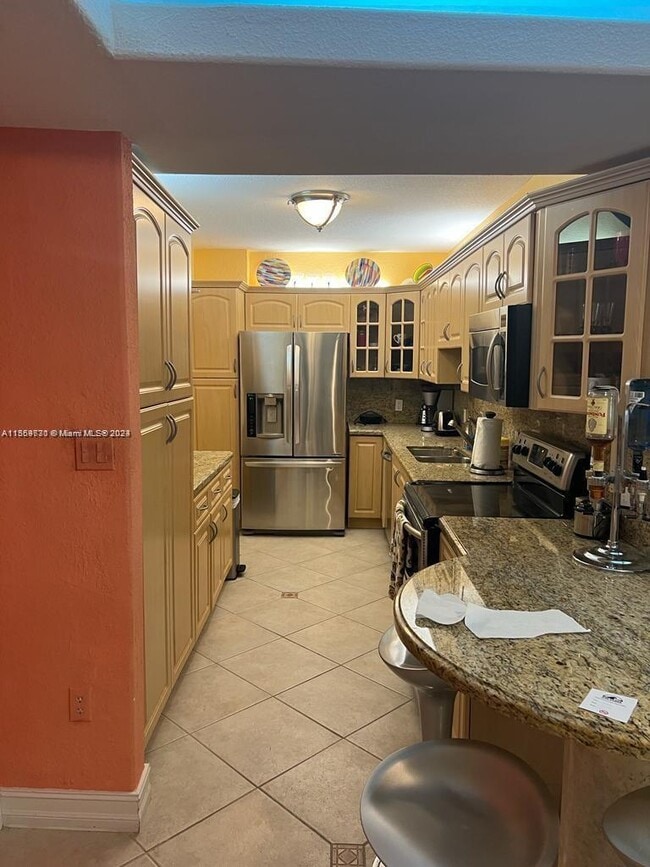 Building Photo - 10185 Collins Ave