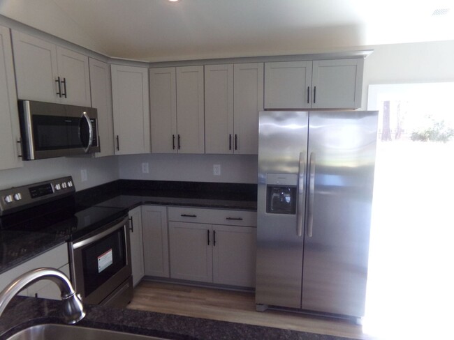 Building Photo - NEW! 3 bedroom home