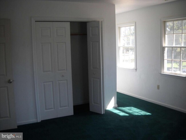 view of closet in one of the bedrooms - 413 Riverview Rd