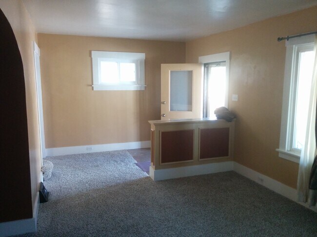 Living room, showing front entrance. - 1139 Illinois Avenue