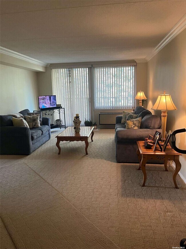 Foto del edificio - 209-33-209-26 26th Ave