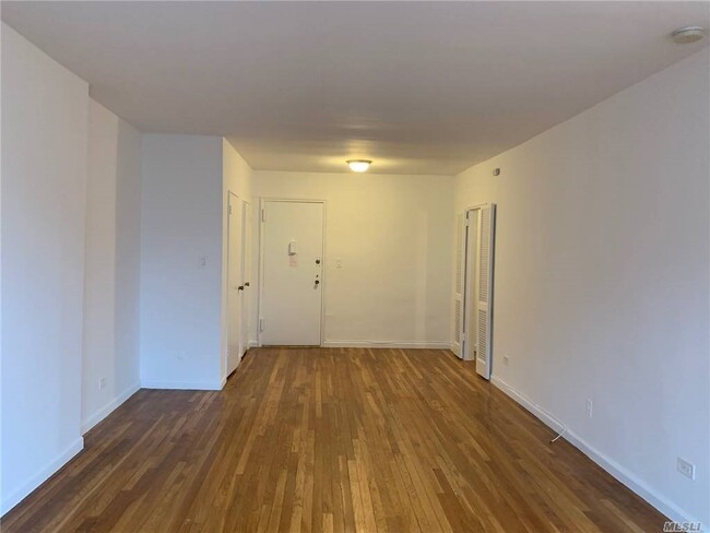 Building Photo - 102-30 Queens Blvd