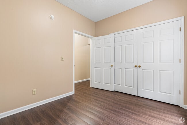 1BR, 1BA - 750SF - Primary Bedroom - Mason Manor Apartments