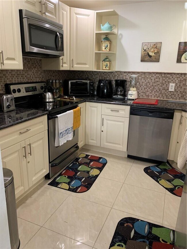 Building Photo - 8657 Boca Glades Blvd