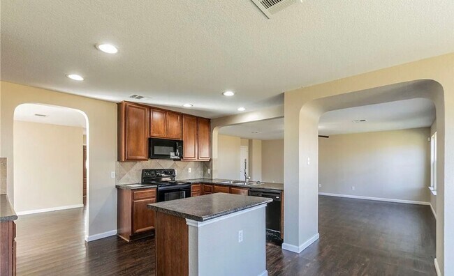 Building Photo - NEW IN MANAGEMENT - AVAILABLE NOW!