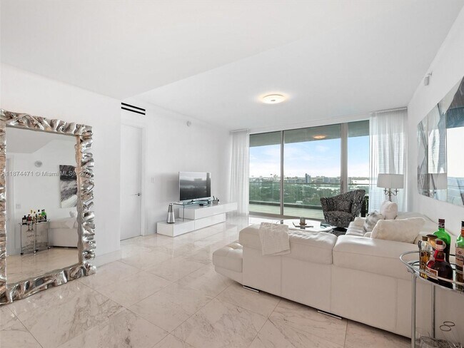 Building Photo - 10203 Collins Ave