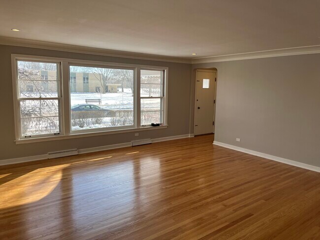 Living room picture window overlooking Olympia Park - 6558 N Olympia Ave
