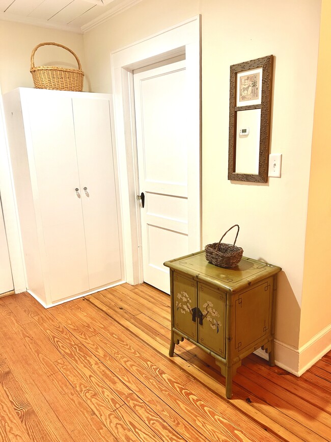 Hallway with fully stocked linen closet - 345 E 13th St