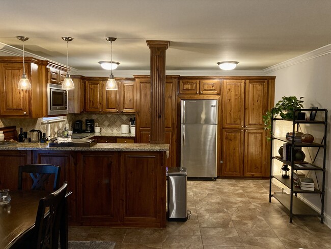 Cypress Cabinets and Granite Countertops - 1290 Park Blvd