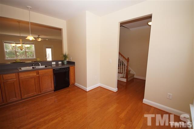 Kitchen to Foyer - 303 W Savannah Ridge Rd