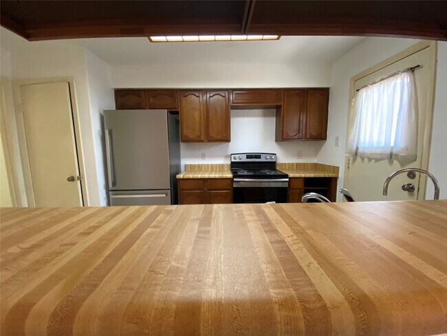 Foto del edificio - 7846 Green Lawn Dr