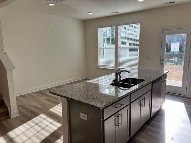 Building Photo - Like-New 3BR Townhome in Spring Village | Garage | Minutes to Downtown Angier