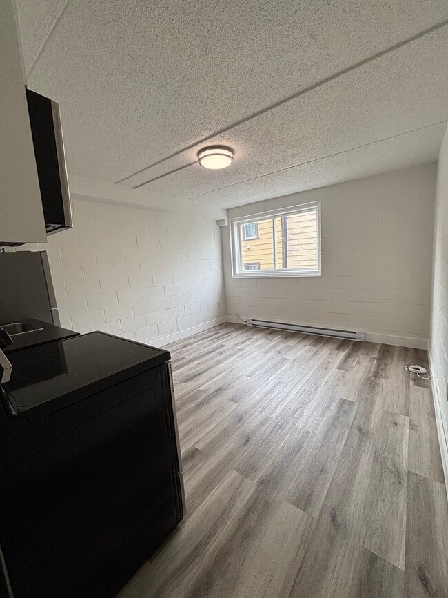 Building Photo - NEWLY RENOVATED - BACHELOR UNITS