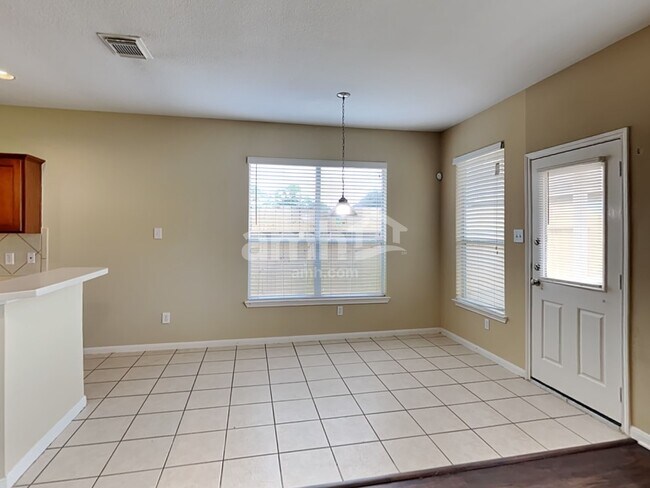 Foto del edificio - 15742 Flagstone Walk Way