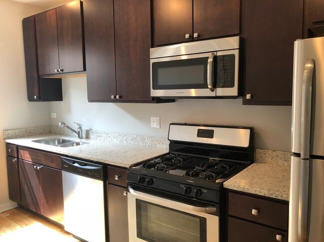 Modern Kitchen with SS Appliances - 6704 N Artesian Ave