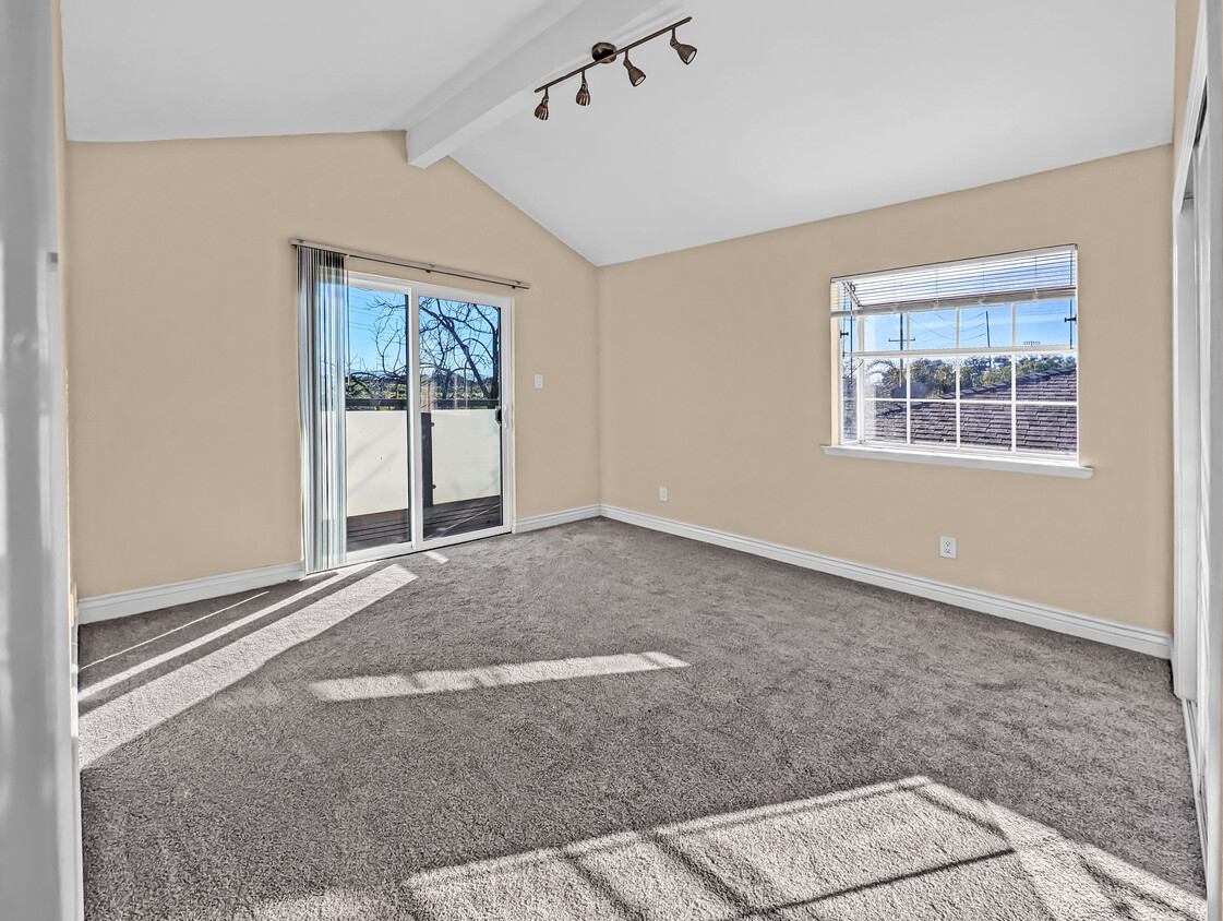 Bright room with brand new carpet and wall paint. Sliding door to private balcony, garden window - 136 Jasmine Way