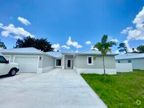 Building Photo - 5807 Raintree Trail