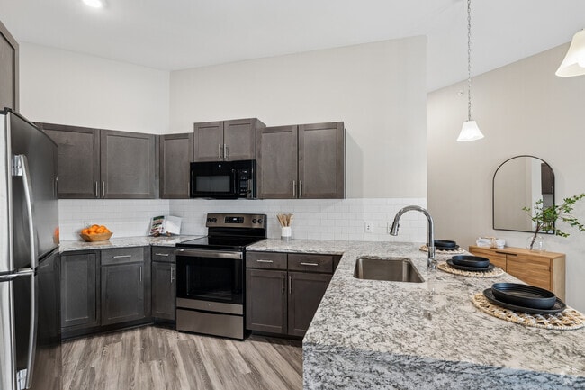 Oakwood - 2BR, 2BA - 1,110SF - Kitchen - Woodstone at Metro North Crossing