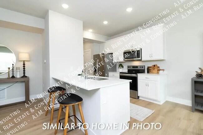 Foto del edificio - 217 NE Crossing Oaks Ln