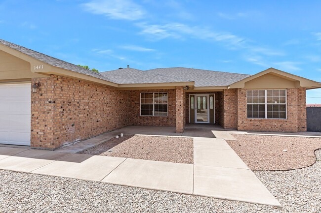 Building Photo - 4 Bedroom 2 Bath with Solar on a Large Corner Lot