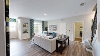 Located at 623 Moti Ct in Ewing, NJ, this well-appointed two-story home offers one bedroom, three full bathrooms, two dedicated office spaces, and a thoughtfully designed layout spread across two floors. The main level opens into a bright, open-concept living, dining, and kitchen area. The living room features rich wood-look flooring, neutral walls, and large windows that invite natural light. The adjacent dining area is illuminated by a stylish industrial pendant light and flanked by windows with neighborhood views. The kitchen is outfitted with rich dark cabinetry, granite countertops, stainless steel GE appliances — including a gas range, microwave, dishwasher, and refrigerator — and a tile backsplash, offering both function and style. Upstairs, the generously sized primary bedroom is carpeted and connects to a well-finished en-suite bathroom featuring dual sinks, dark wood cabinetry, granite countertops, and wood-look tile flooring. A convenient in-unit laundry room houses a full-size GE washer and dryer with overhead shelving. Two versatile office spaces provide ample flexibility for remote work or additional living needs. Three full bathrooms throughout the home ensure comfort for residents and guests alike.