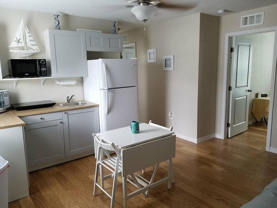 Kitchen area right as you walk in (stove inc) - 332 10th Ave NE
