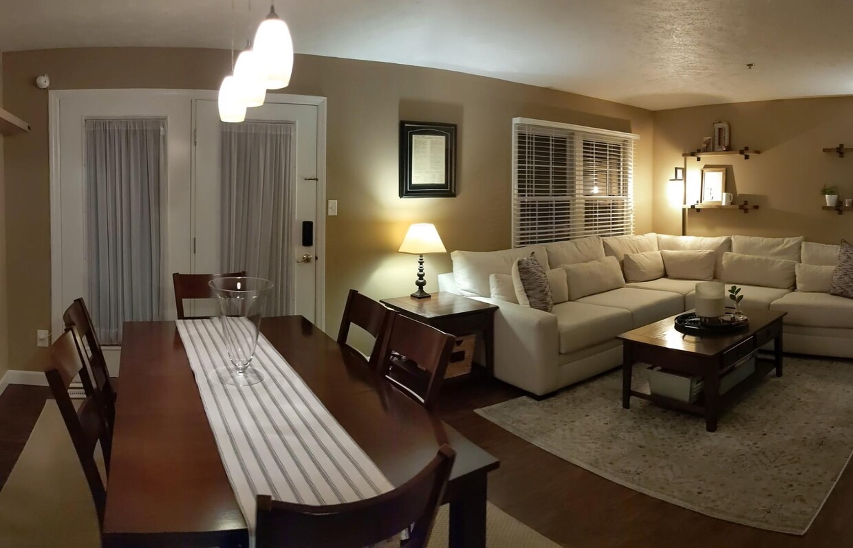Spacious living room and dining room area. - 205 Fieldbrook Dr