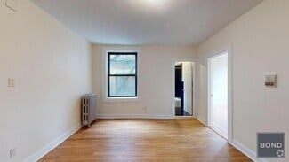 Building Photo - 207-209-209 W 11th St