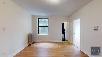 Building Photo - 207-209-209 W 11th St