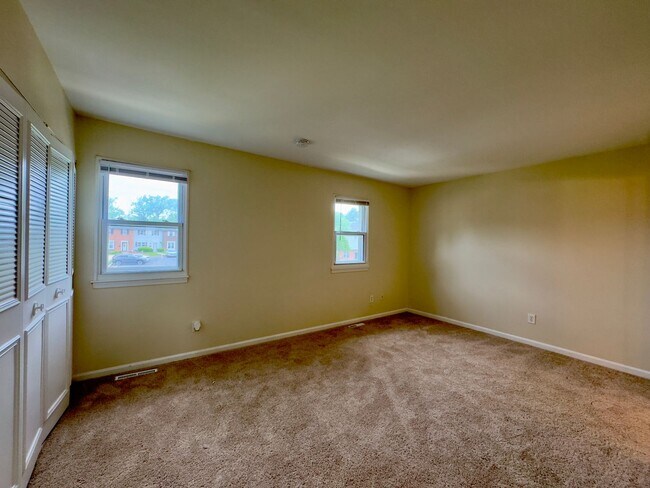 Building Photo - Modern 3-Bedroom Townhome with Spacious Ya...
