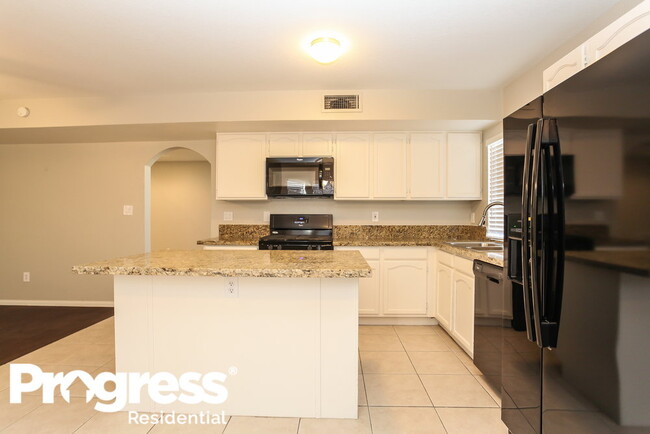 Building Photo - 7621 Desert Breeze Ave