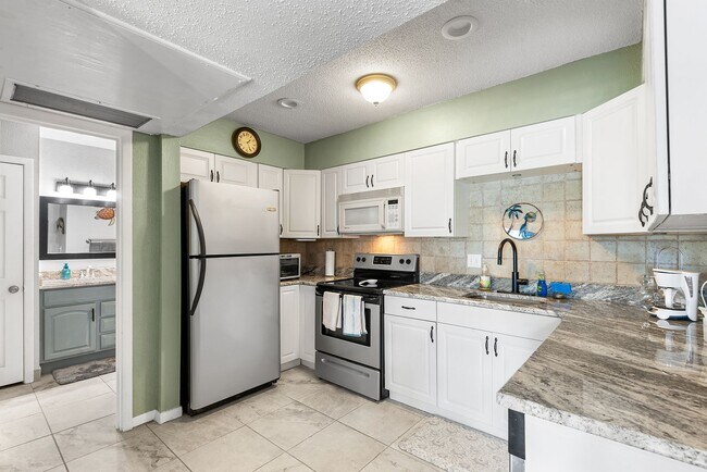 Building Photo - TREASURE ISLAND CONDO AVAILABLE!