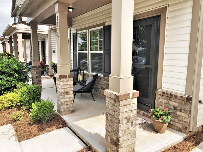 Quaint front porch living space - 113 Brookshire Ln