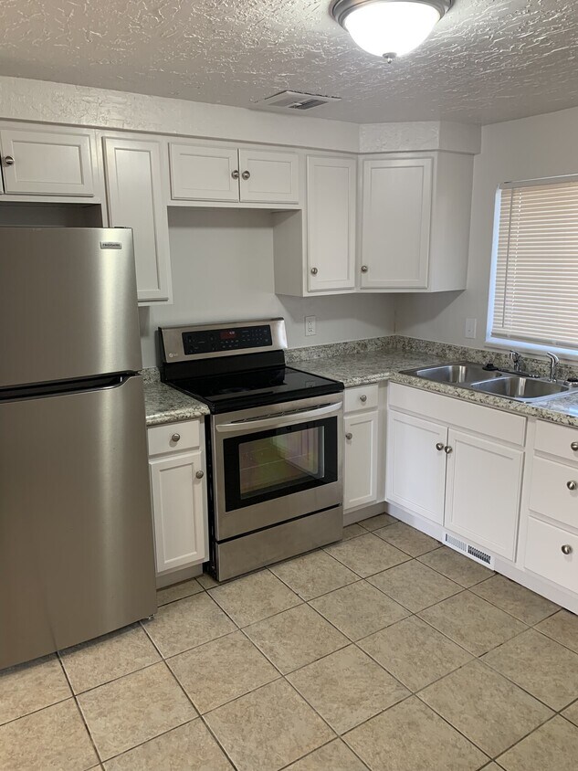 Building Photo - Roy 4-plex 2014