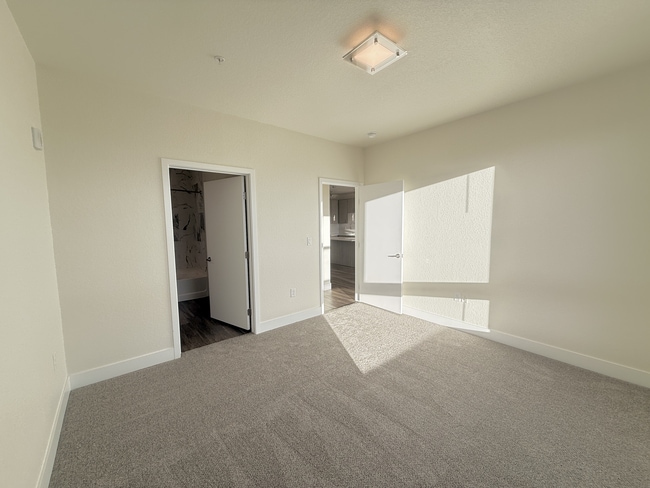 2nd-bedroom-high-line-pointe-B5-2x2.5-1301-600-pikes-peak-3-13-2026(1).JPG - High Line Pointe
