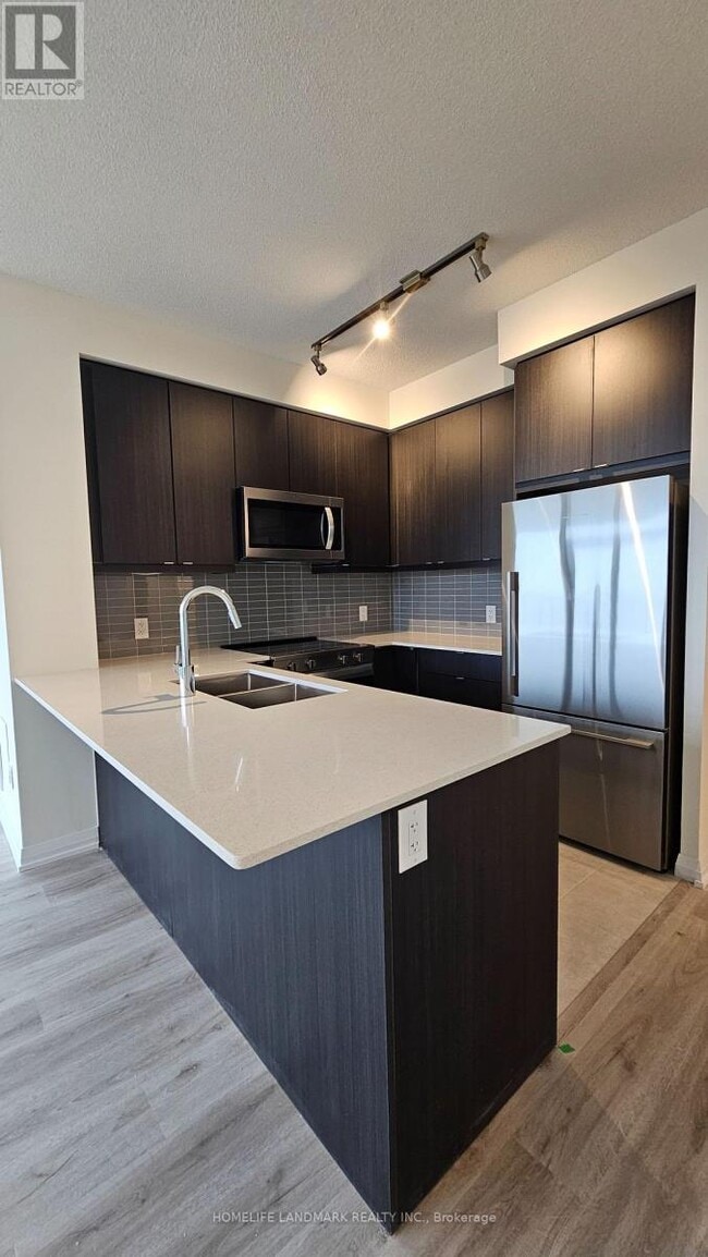 Building Photo - 3260 Sheppard Ave E