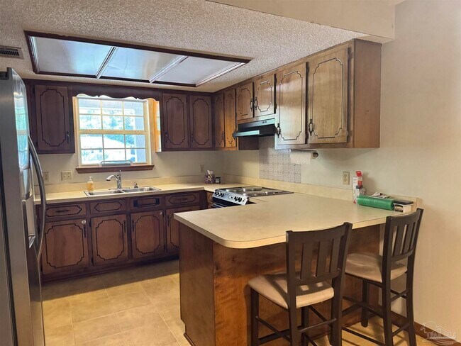 Foto del edificio - 4651 W Bushnell Rd