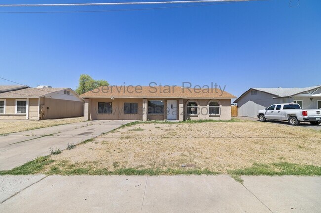 Building Photo - 9912 N 87th Ave