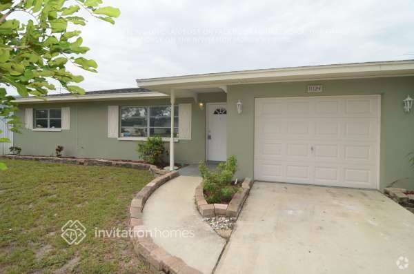 Building Photo - 11124 64th Terrace N