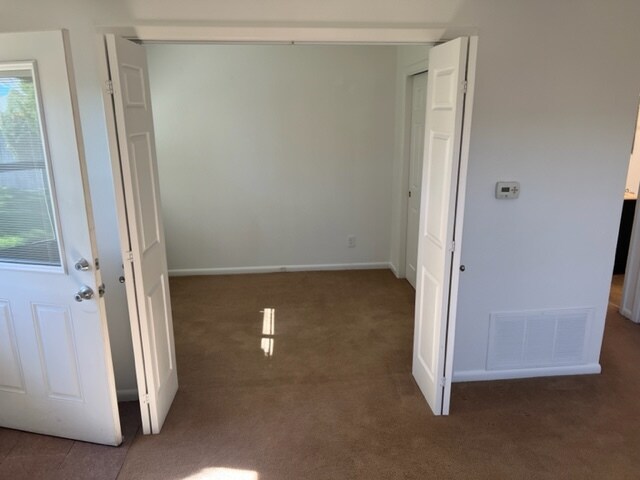 Bi-fold doors to bedroom with full closet - 81 W Southern St