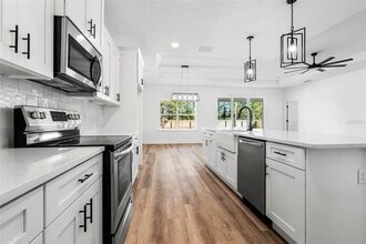 Building Photo - 6670 SW 13th Ln