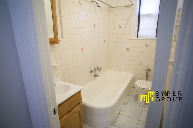 Building Photo - 6914 6th Ave