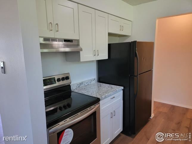 Building Photo - 3 br, 1 bath House - 1613 i Longs Peak Dr